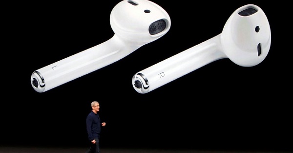 AirPods are displayed as Apple CEO Tim Cook makes his closing remarks during an Apple media event in San Francisco, California, Sept. 7, 2016.