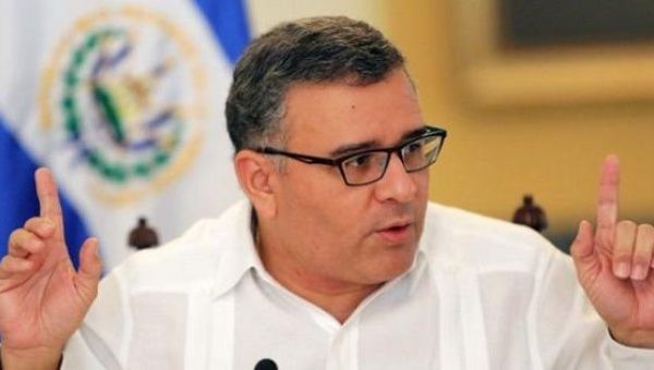 Mauricio Funes sits during a press conference.