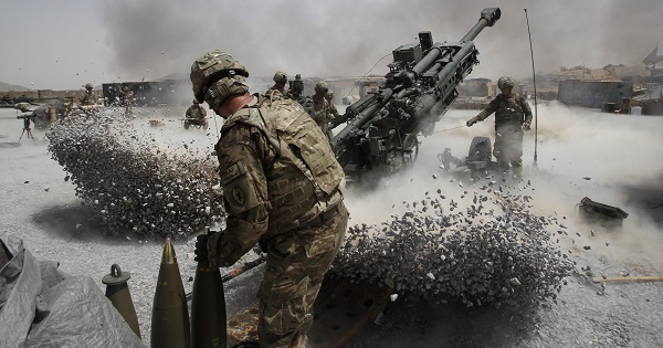 U.S. Army soldiers from the 2nd Platoon, B battery 2-8 field artillery, fire a howitzer artillery piece at Seprwan Ghar forward fire base in Panjwai district, Kandahar province southern Afghanistan, June 12, 2011.