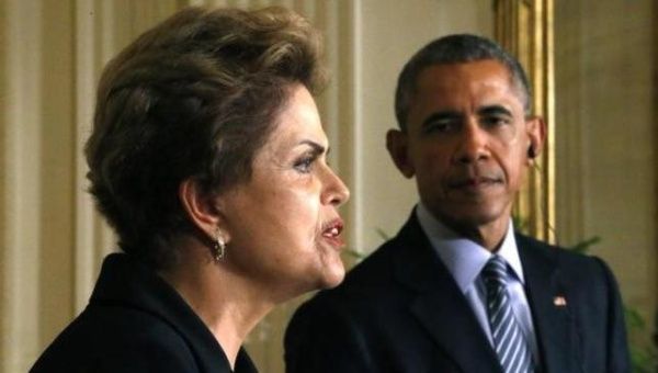 U.S. President Barack Obama and Brazil's President Dilma Rousseff (L) hold a joint news conference in the East Room of the White House in Washington June 30, 2015.