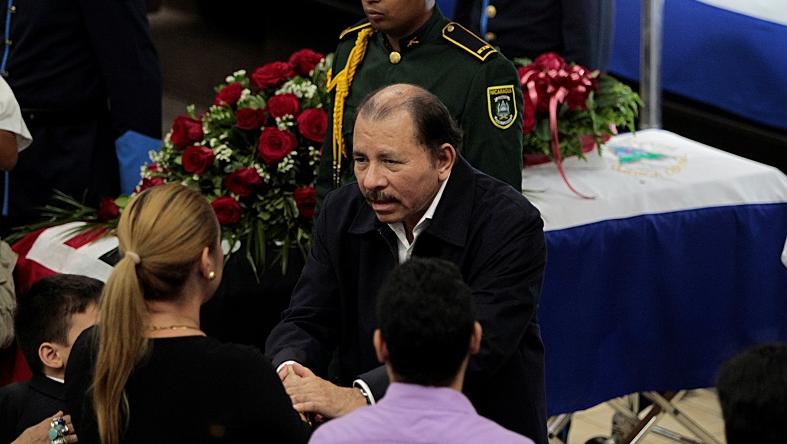 Nicaragua's President Daniel Ortega gives his condolences to relatives of the late President of the National Assembly of Nicaragua, Rene Nunez during memorial service at the National Assambly Building in Managua, Nicaragua September 11, 2016.