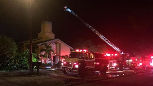  Emergency personnel are seen at the Islamic Center of Fort Pierce which was set on fire, in Fort Pierce, Florida, Sept. 12, 2016.
