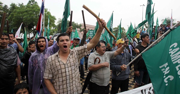 Paraguayan campesinos march on the capital Asuncion to demand agrarian reform, March 26, 2015.