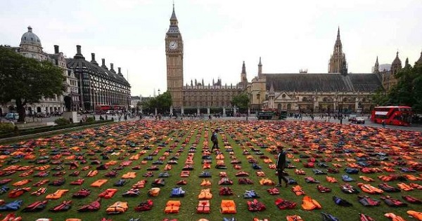 A display of life jackets worn by refugees during their crossing from Turkey to Greece are seen in Parliament Square in the U.K., Sept. 19, 2016.