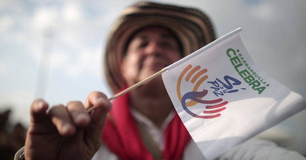 A citizen participates in a major demonstration in favour of the agreement, in Barranquilla, Colombia