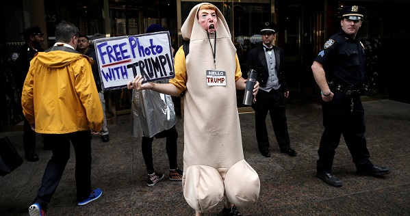 A man in a penis costume stands outside Trump Tower where Republican presidential nominee Donald Trump lives in the Manhattan borough of New York.