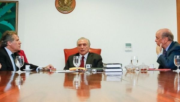 OAS head Luis Almagro (L) meets with de facto Brazilian President Michel Temer (C), and Foreign Minister Jose Serra in Brasilia, Brazil, Oct. 6, 2016.