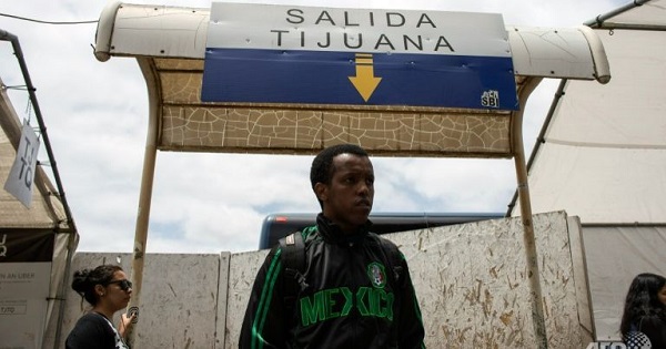 An unidentified migrant from Guinea-Bissau at the Tijuana, Mexican border with the U.S., May 26, 2016.