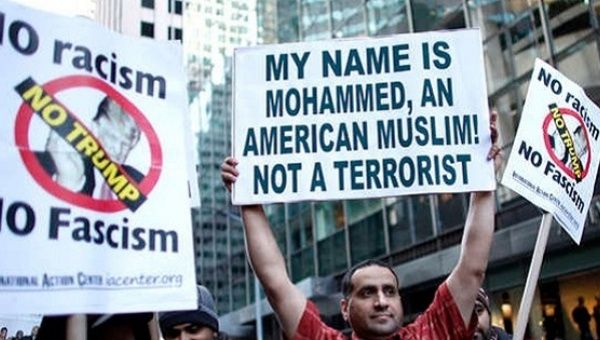 A group of Muslims take part in a rally in front of Trump Tower December 20, 2015 in New York. 