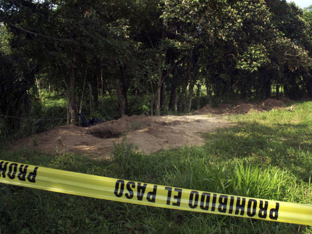 View at Diamante ranch in Nopaltepec, Veracruz state, Mexico on, June 18, 2014, where the bodies of at least 28 people have been exhumed from a mass grave.
