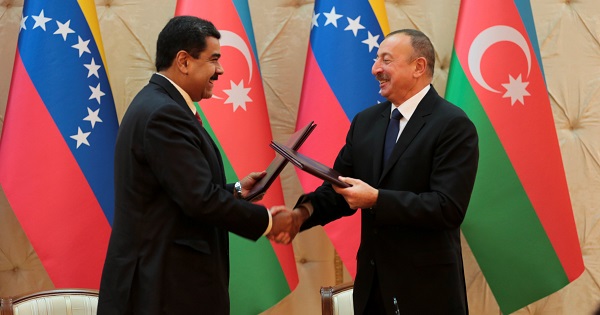 Azerbaijan's President Ilham Aliyev shakes hands with Venezuela's President Nicolas Maduro in Baku.