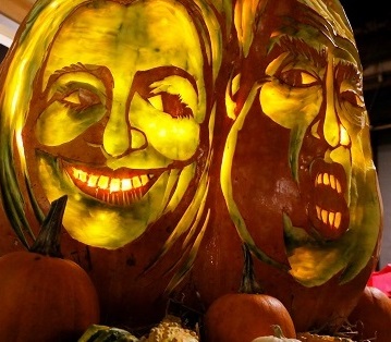 A giant pumpkin with the faces of Democrat Hillary Clinton and Republican Donald Trump is displayed at Chelsea Market in New York, U.S., Oct. 28, 2016.