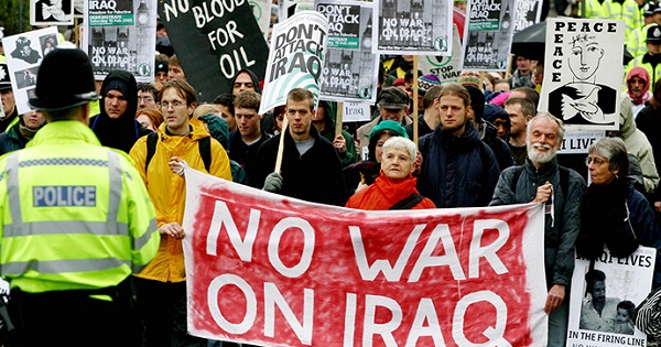 British anti-war protesters demonstrate outside army headquarters in Northwood, Middlesex, January 19, 2003.