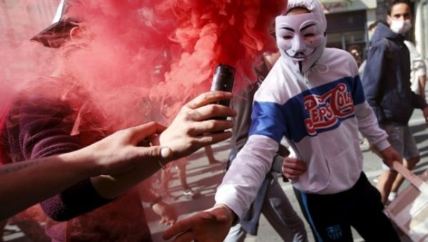 French high school students attend a demonstration against the French labor law proposal in Marseille, France.