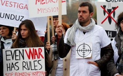 The staff of Medecins Sans Frontieres (MSF), also known as Doctors Without Borders, demonstrates in Geneva, Switzerland November 3, 2015, one month after the U.S. bombing of their charity-run hospital in Kunduz in Afghanistan.