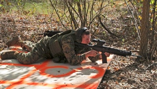 A member of the III% Security Force militia conducts shooting practice during a field training exercise in Jackson, Georgia, U.S. October 29, 2016. 