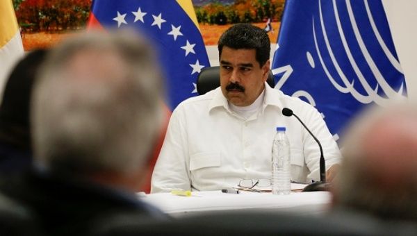 Venezuela's President Nicolas Maduro attends a political meeting between government and opposition in Caracas, Oct. 30, 2016.