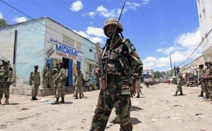 A Djibouti soldier serving in the African Union Mission in Somalia patrols the south central town of Beledweyne in Somalia, May 9, 2013.
