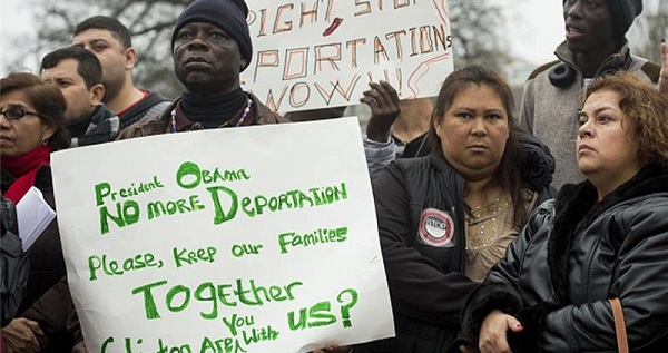 Immigrants and their supporters protest against planned raids to deport undocumented immigrants in Washington, D.C.