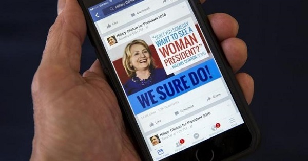 A cell phone shows a Facebook page promoting Hillary Clinton for president in 2016, in this photo illustration taken Apr. 13, 2015.