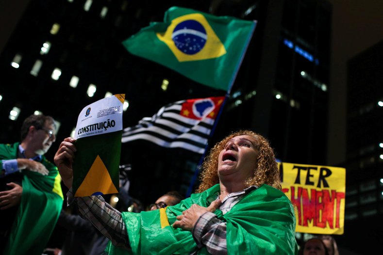 A woman protests against Brazil's President Dilma Rousseff, calling for her impeachment, at Paulista avenue in Sao Paulo, Brazil, May 11, 2016. 
