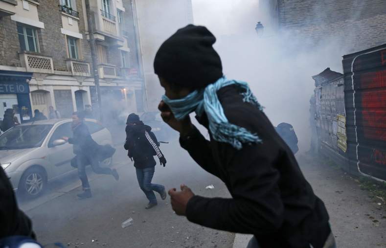 Clouds of tear gas fill the air as protesters face off with the police during a demonstration against what they say is police violence, in Rennes, France, May 14, 2016. 