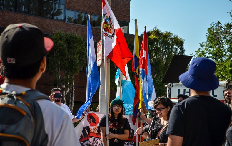 Youth march under the banners of various Latin American countries at East Los Angeles College, May 5, 2016.