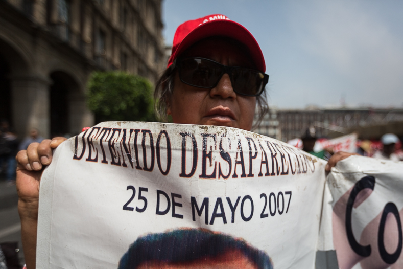 Activists and families of victims carried the images of their disappeared loved ones. The march organizers argue that the crime of forced disappearance has been a practice used by the Mexican state for decades to attack and silence social movement leaders and dissidents.