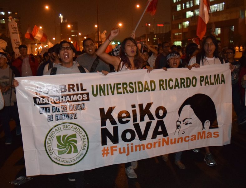 Students hold anti-Fujimori banner in Lima, Peru, May 31, 2016.