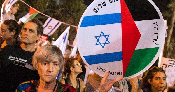 Israeli left-wing activists in Tel Aviv demanded fresh peace talks with Palestinians on the eve of the 20th anniversary of the killing of Prime Minister Yitzhak Rabin.