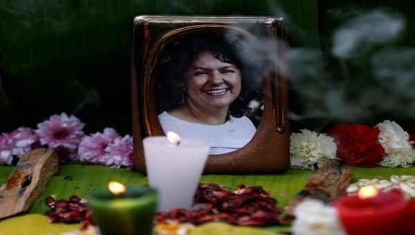 A picture of environmental rights activist Berta Caceres is seen during a demonstration in demand for justice for her murder outside the Embassy of Honduras in Mexico City, Mexico June 15, 2016. 