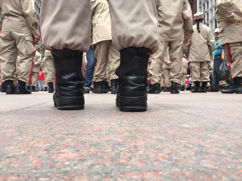 The rows of boots of the Venezuelan National Militia are seen Thursday.