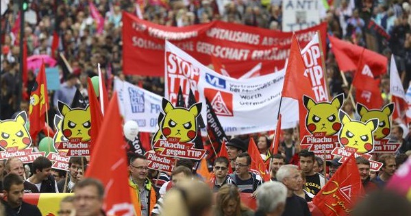 Activists take part in a march to protest against the TTIP and CETA in Frankfurt, Germany, September 17, 2016.