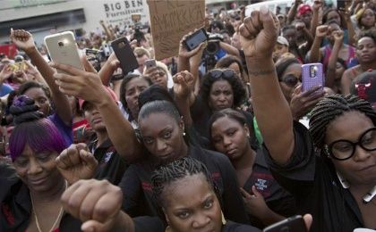 Demonstrators mourned the loss of Alton Sterling, chanting 
