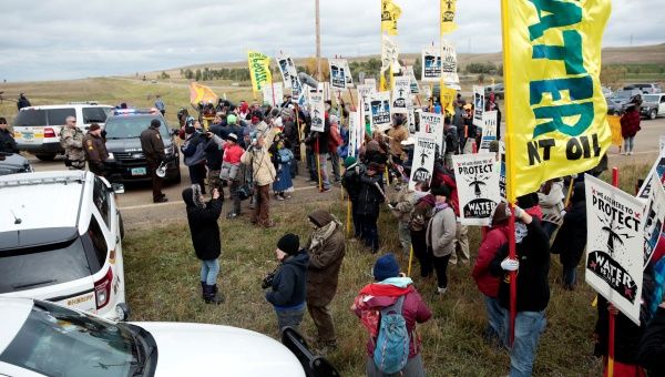 Protesters square off against police outside the little town of Saint Anthony, North Dakota, U.S., Oct. 5, 2016.
