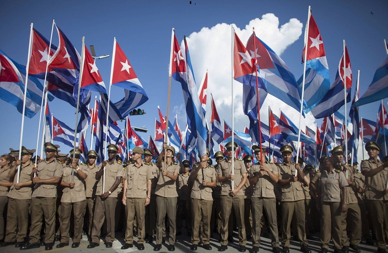 Soldiers wave the Cuban flag during Cuban Revolution commemorations in recent years.