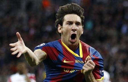 Barcelona's Lionel Messi celebrates after scoring against Manchester United during their Champions League final soccer match.