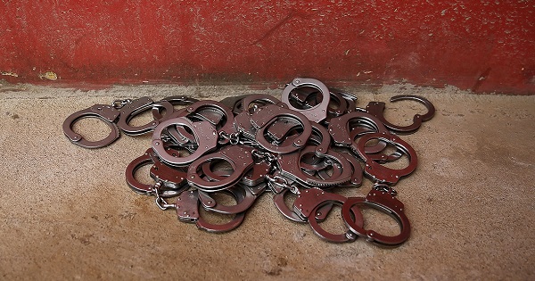 Handcuffs lie on the floor at the entrance of Acuda's headquarters at a prison complex in Porto Velho.