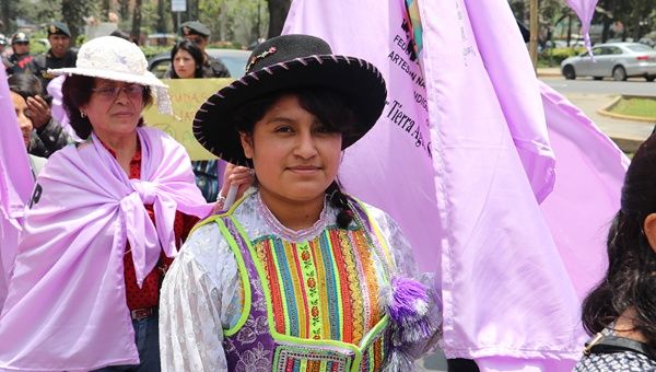 The march included women of various ages all wearing traditional clothing from their regions.