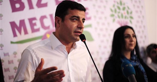Selahattin Demirtas (L) flanked by Figen Yukseldag (R), co-chair of the pro-Kurdish Peoples' Democratic Party (HDP) speaks during a press conference in Istanbul.