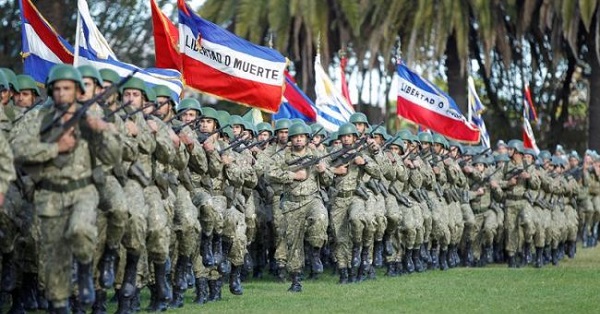Uruguayan troops during a military parade in Montevideo to mark the 205th anniversary of the Battle of Las Piedras, a key event in Uruguay's independence struggle.