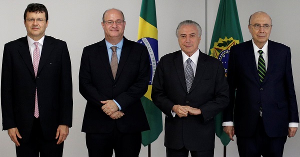 Brazil's interim President Michel Temer and other newly-appointed officials pose for photographers during a meeting at the Planalto Palace in Brasilia.