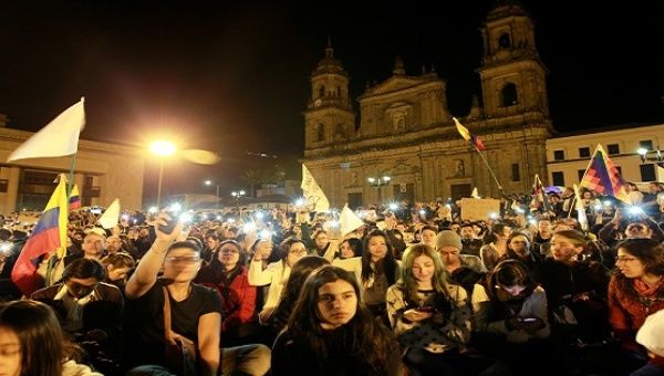 Supporters of the peace deal signed between the government and the Revolutionary Armed Forces of Colombia (FARC) rebels gather at Bolivar Square during a march for peace in Bogota, Colombia, October 20, 2016.