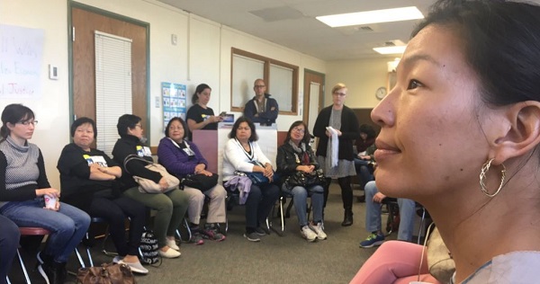 Ai-Jen meets with domestic workers in Colorado to discuss raising the minimum wage and blocking Trump from being elected.