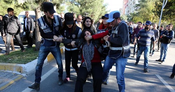 Police detain activist Sebahat Tuncel during a protest against the arrest of Kurdish lawmakers, in the southeastern city of Diyarbakir, Turkey, Nov. 4, 2016.