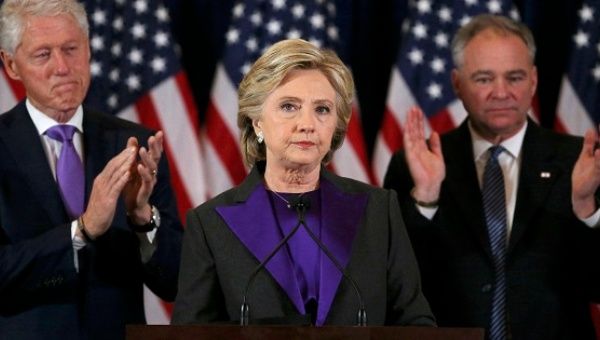 Hillary Clinton, accompanied by Bill Clinton and running mate Tim Kaine, speaks about the results of the U.S. election at a hotel in New York, Nov. 9, 2016.