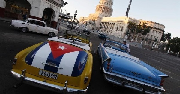 Cars parked outside El Capitolio, Havana, Cuba.