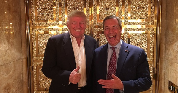 Farage poses with Trump.
