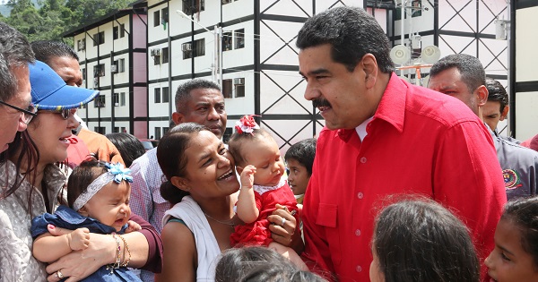 President Nicolas Maduro is greeted by supporters at an event to celebrate the over one million housing units built by the government, Trujillo, Venezuela, Nov. 10, 2016.