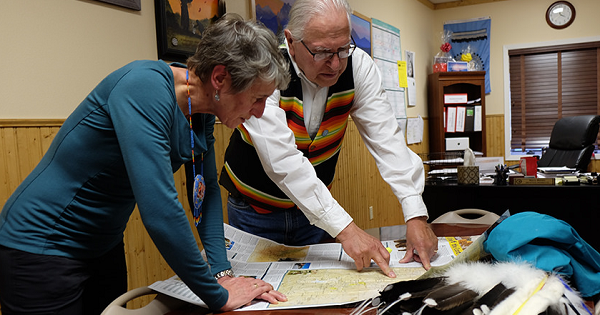 Blackfeet Nation Chairman Harry Barnes and Interior Secretary Sally Jewell review a map of the Blackfeet reservation.